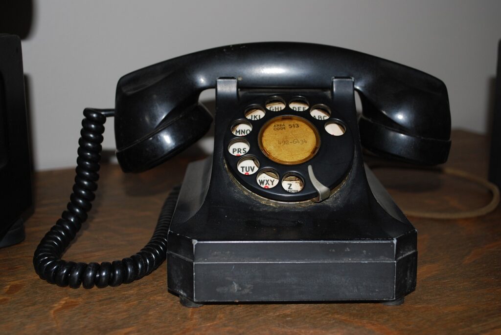 Old black dial telephone.