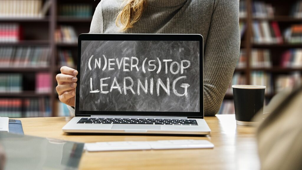 Words on a computer screen saying Never Stop Learning.