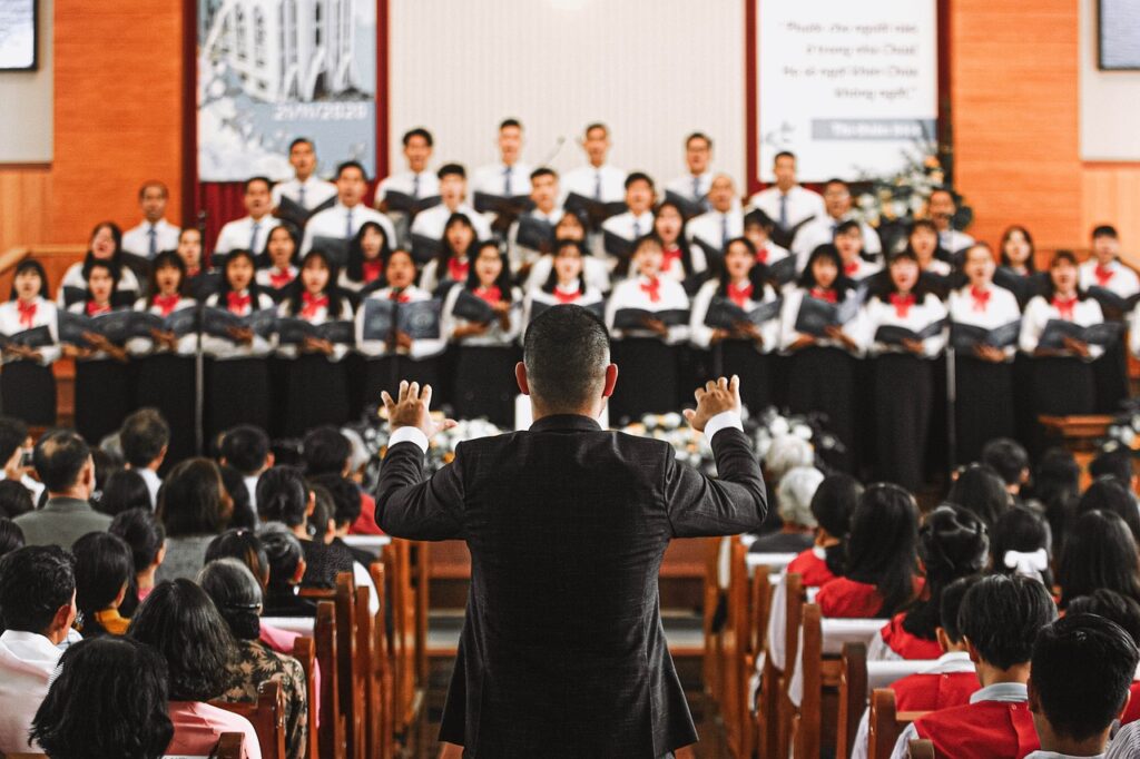 A school choir with a conductor.