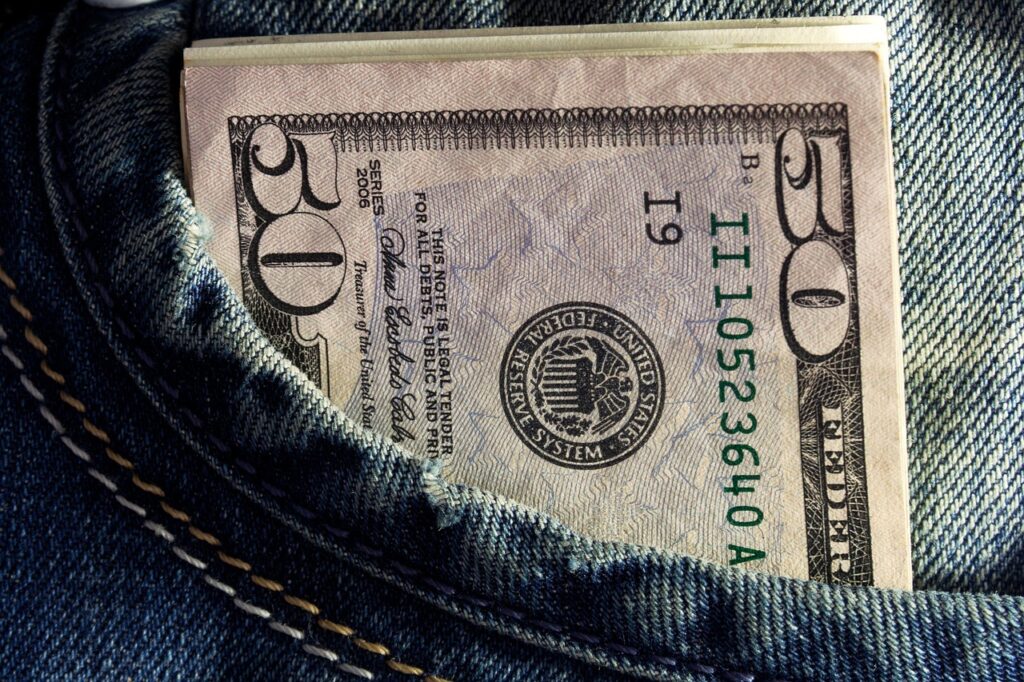 A $50 bill in a pants pocket.