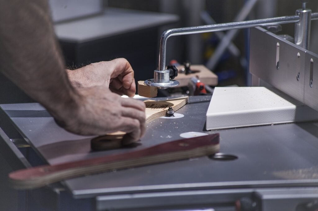 A man using a router table.