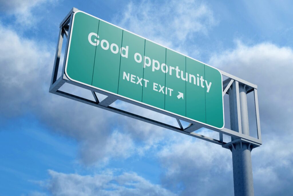 A highway sign which says "Good opportunity next exit".