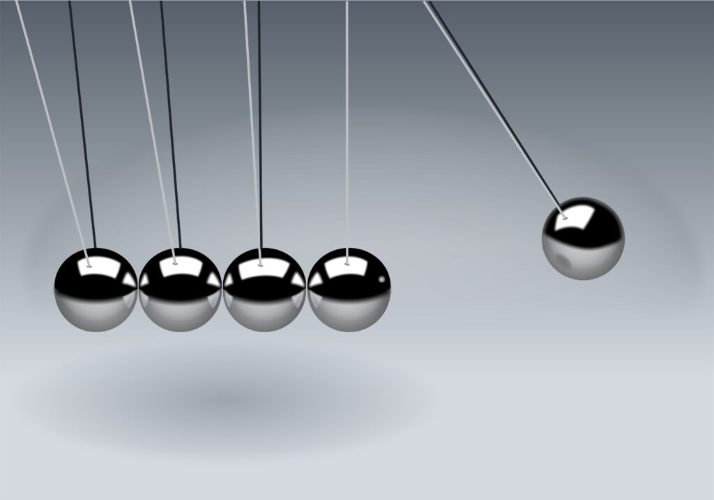 Steel balls hanging in a Newton's cradle.